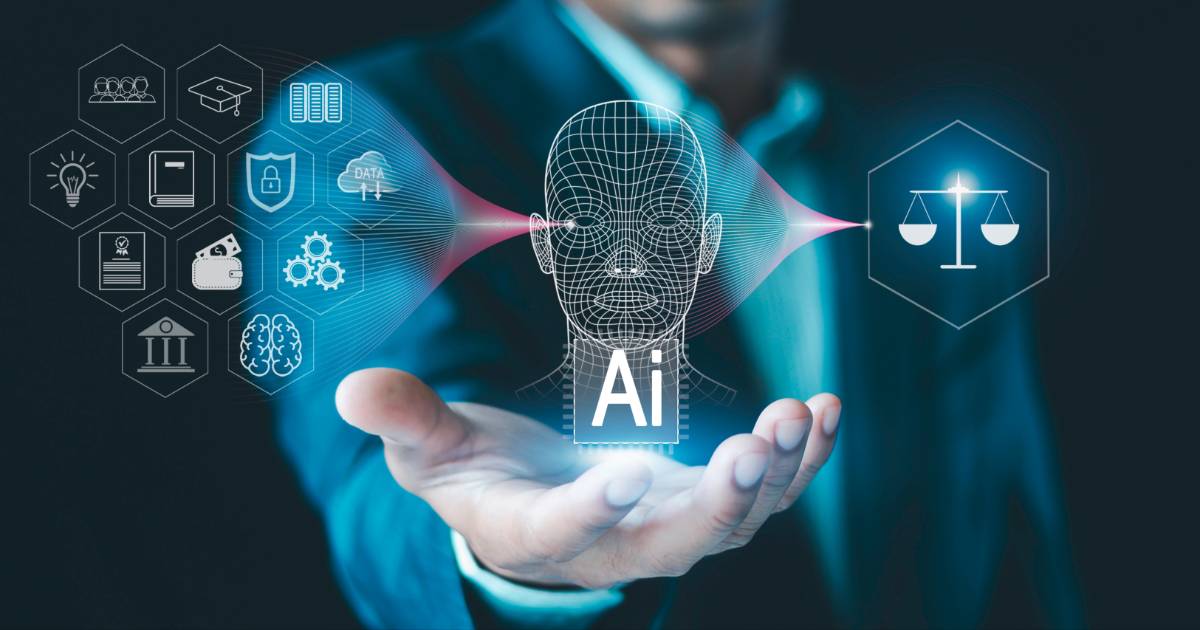 Imagem de uma mão estendida segurando uma representação digital de inteligência artificial (IA), com um rosto de malha 3D ao centro e ícones flutuantes ao redor. Os ícones simbolizam justiça, privacidade, proteção de dados, educação, governança e inovação tecnológica. A balança representa a conexão da IA com questões legais e éticas, enquanto outros ícones destacam suas aplicações práticas em diversos setores, marco regulatório (tendências, pesquisa)